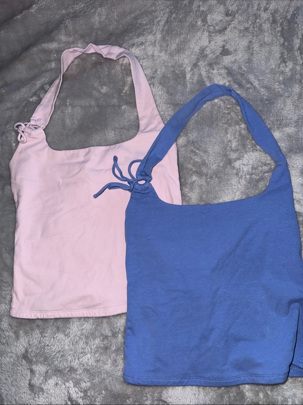 Set of Two Sleeveless Knot-Shoulder Halter Tops in Light Pink and Light Blue